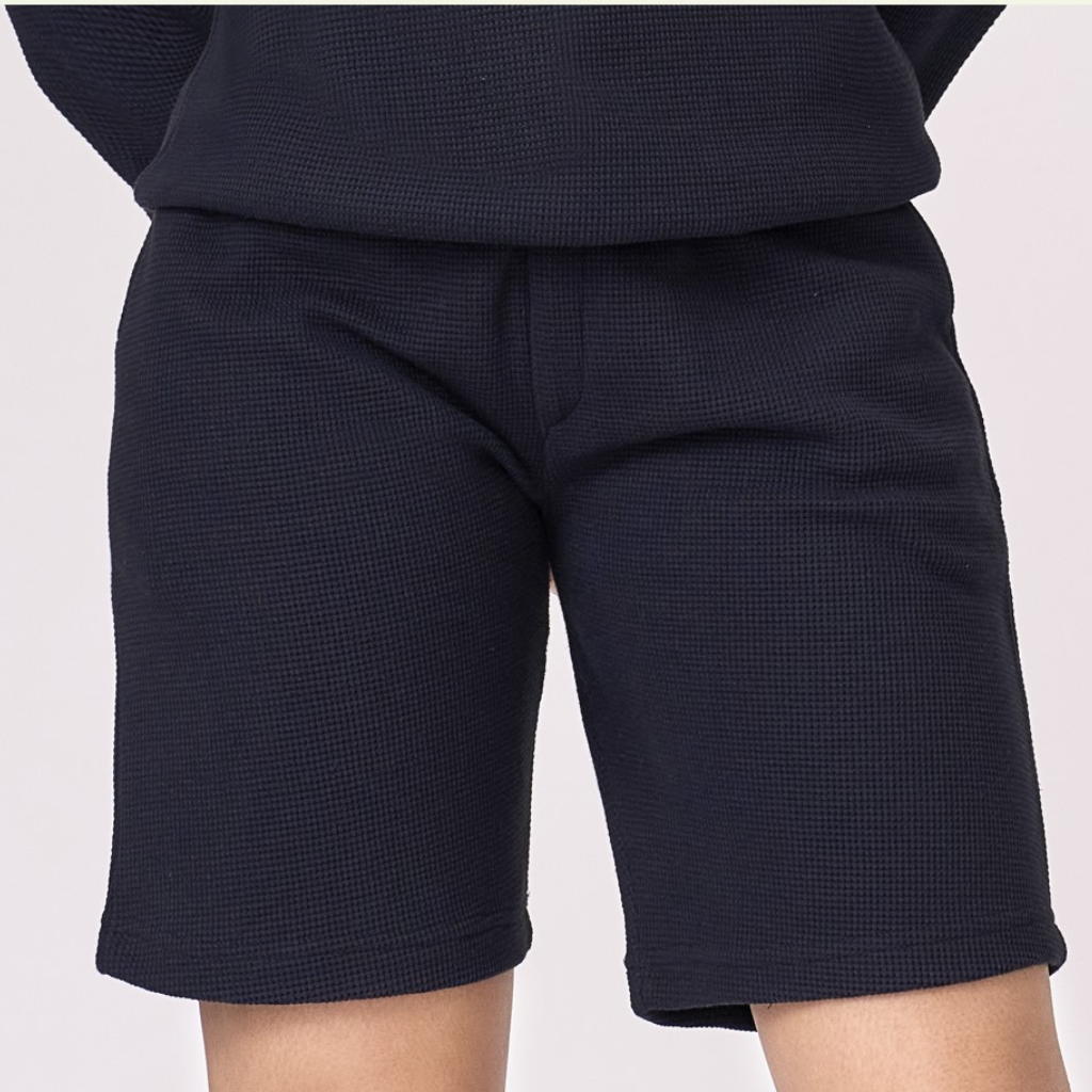 Midnight Blue textured half pant unisex jogger made of 97% Cotton 3% Polyester.